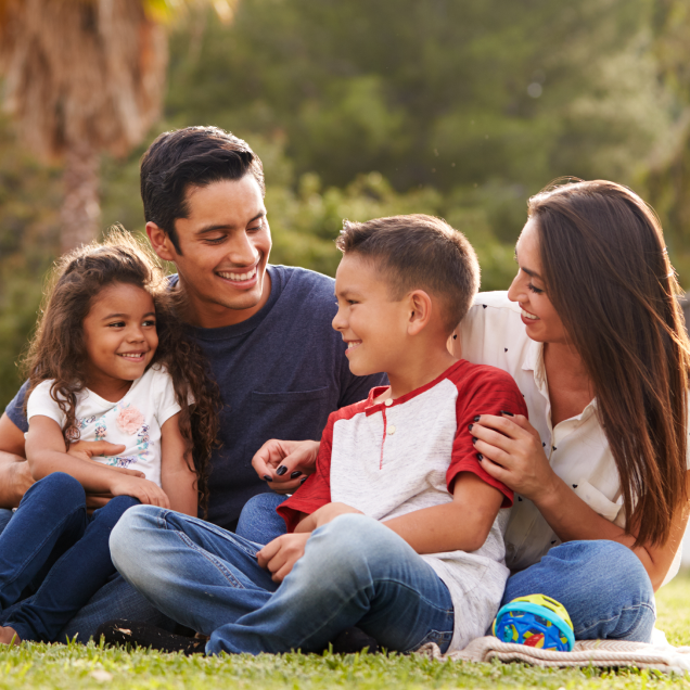 family playing in park